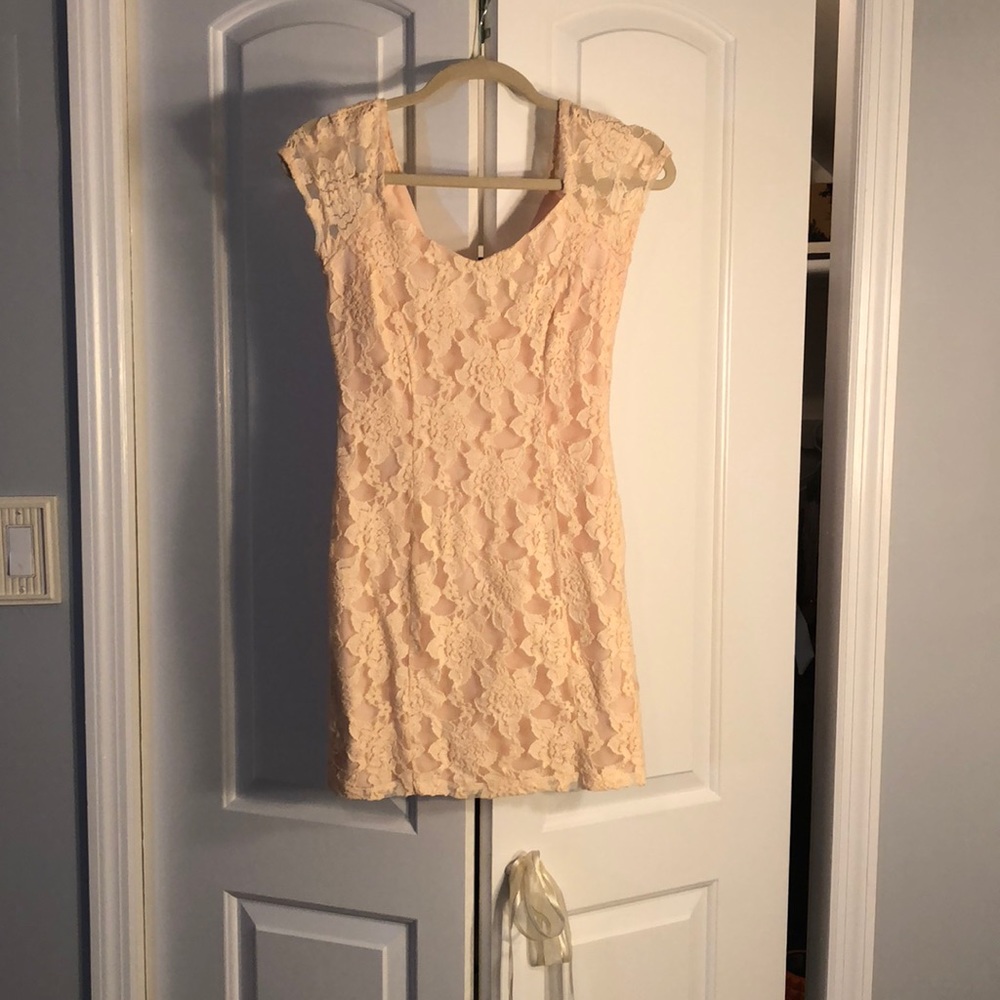 Light peach mini-dress with lace overlay